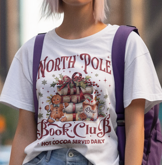 North Pole Book Club T-Shirt & Sweatshirt - Cozy Christmas Book Lover’s Apparel with Hot Cocoa Design